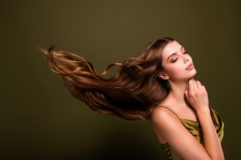 Long, shiny hair flowing naturally