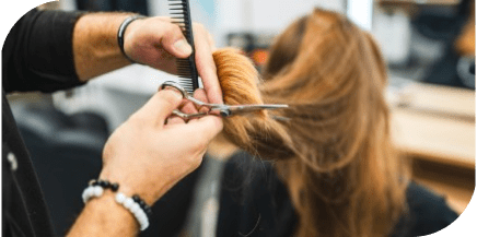Professional haircut service performed by hairstylist at a hair salon