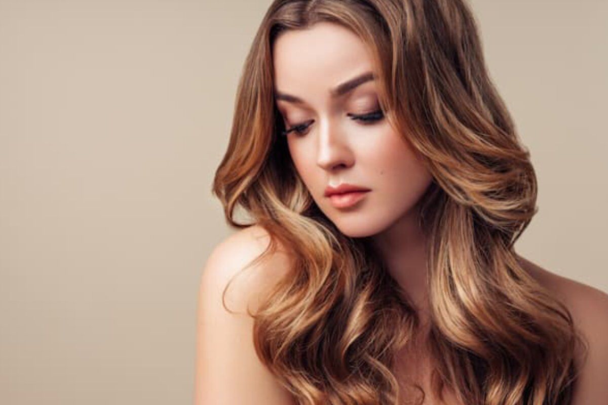 Perm hair service results with styled curls and waves